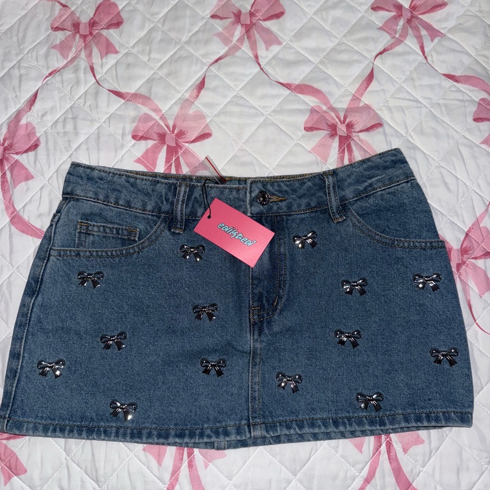 Chicwish Denim Mini Skirt with Black Bow Details